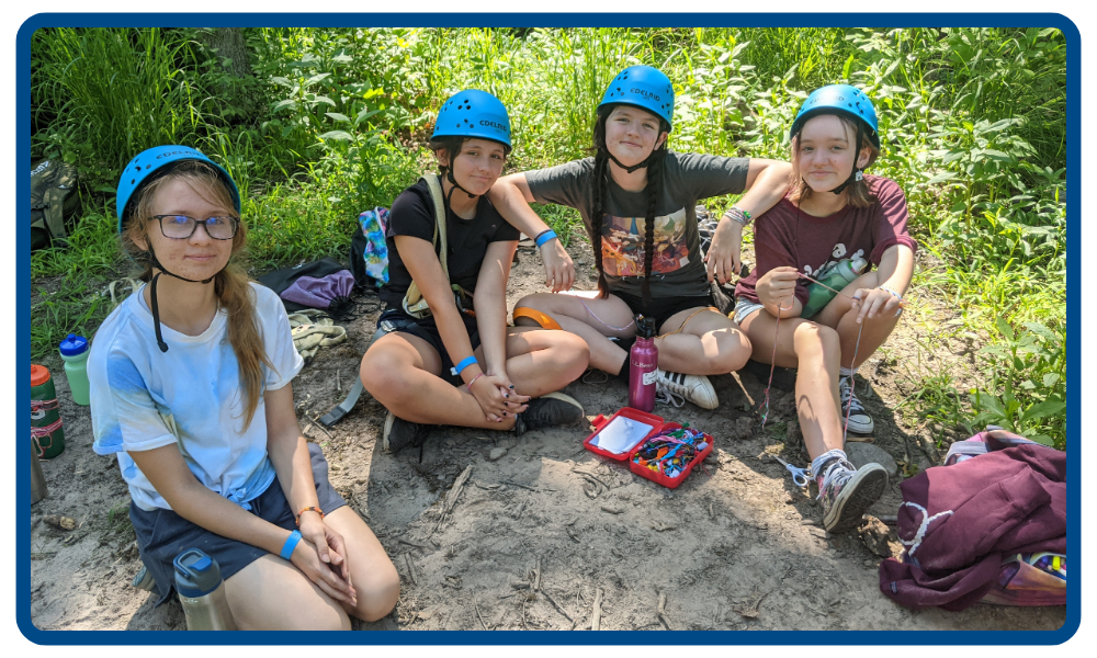 girls relaxing after completing the high ropes course at Camp Small Valley